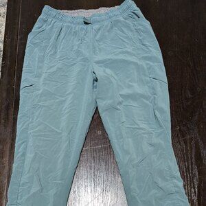 Green athletic track pants